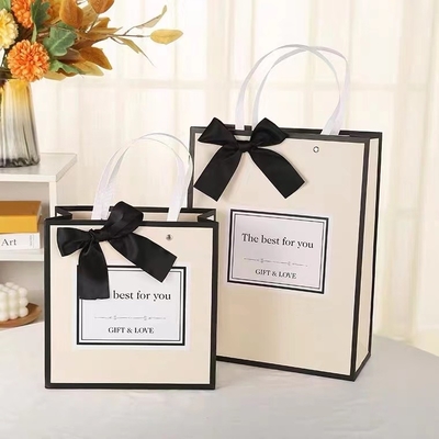 White Art Printed Paper Shopping Bag With Rope Handle Varnishing