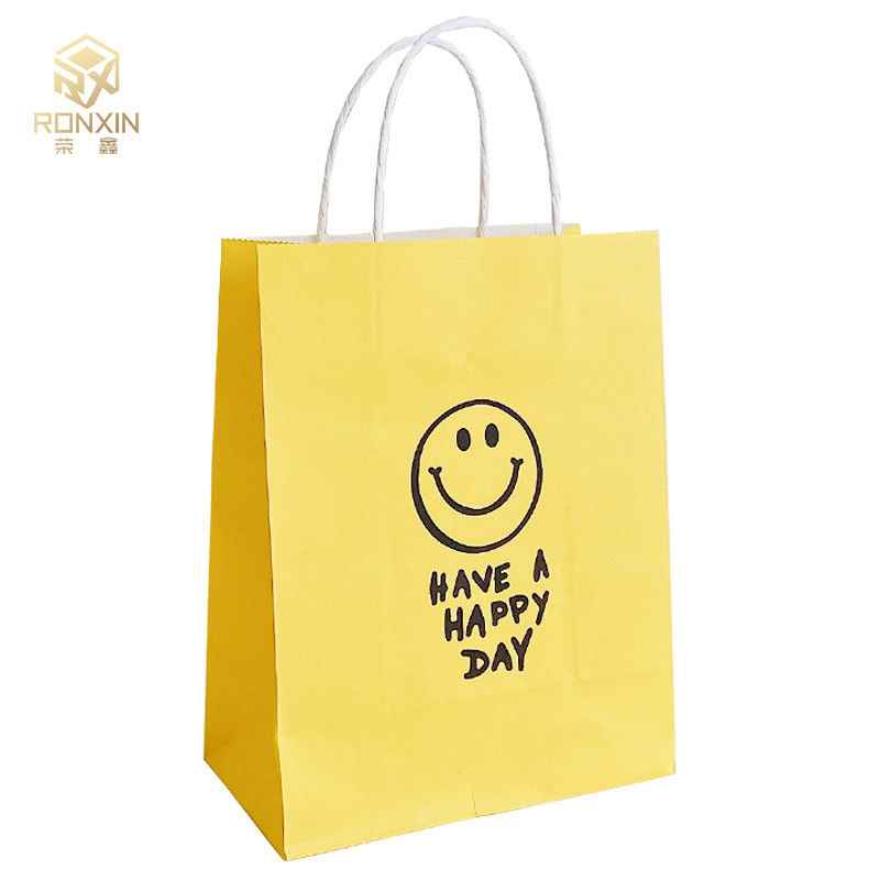 26cm Height Coated Yellow Paper Gift Bags Reusable With Smile Face